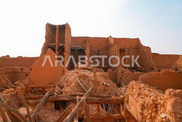 Crumbling mud brick ruins of an ancient building in the historic village of Shaqra, Saudi Arabia