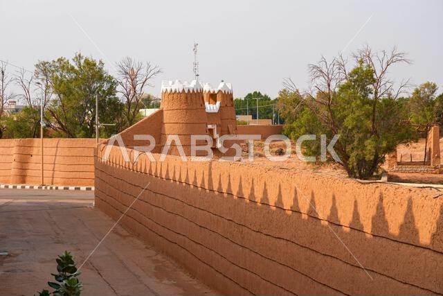Ancient mud brick city walls and watchtowers in the historic village of Shaqra, Saudi Arabia