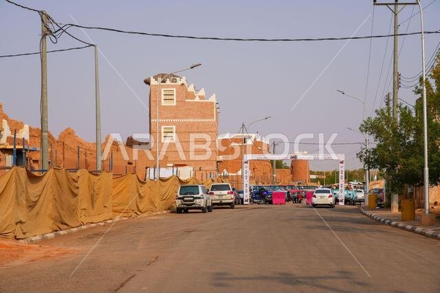 Classic vintage cars parked in the historic mud brick village of Shaqra in Saudi Arabia
