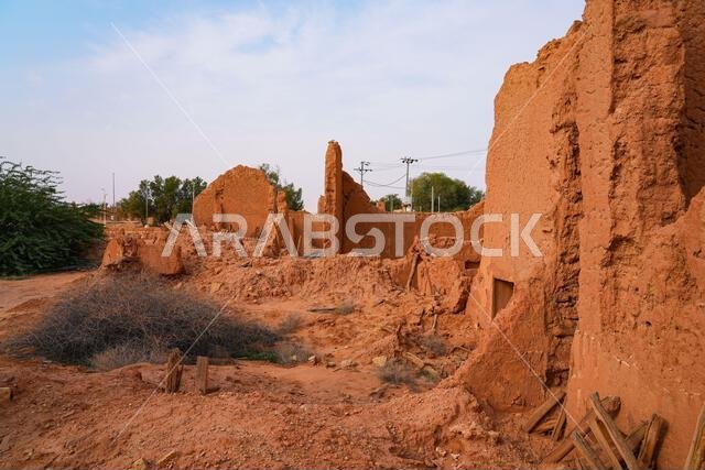 Crumbling mud brick ruins of an ancient building in the historic village of Shaqra, Saudi Arabia