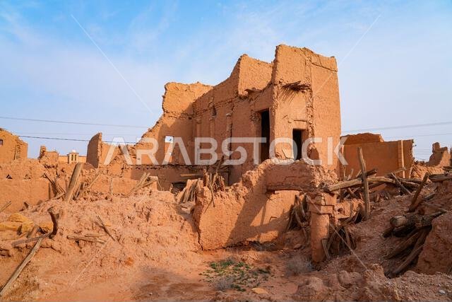 Crumbling mud brick ruins of an ancient building in the historic village of Shaqra, Saudi Arabia