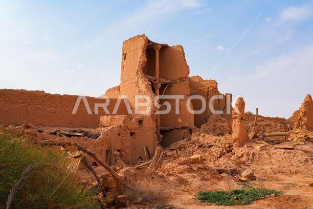 Crumbling mud brick ruins of an ancient building in the historic village of Shaqra, Saudi Arabia