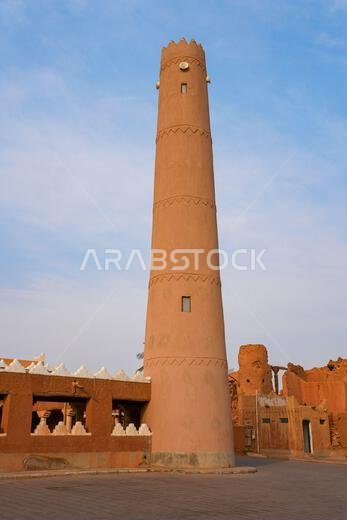 Traditional Najdi mud brick minaret of Shaqra Old Mosque in Saudi Arabia