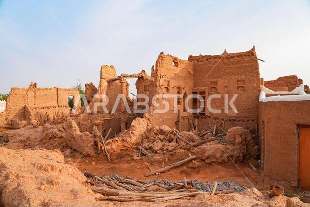 Crumbling mud brick ruins of an ancient building in the historic village of Shaqra, Saudi Arabia