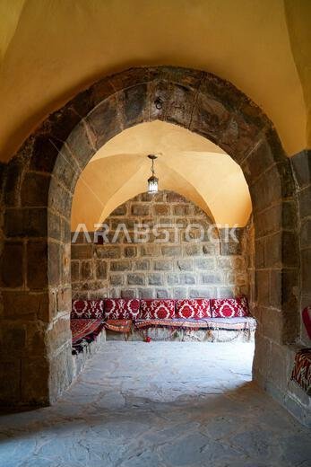 Traditional Majlis seating area inside the historic Tabuk Castle, an ancient Ottoman fortress along the Hajj pilgrimage route in Saudi Arabia