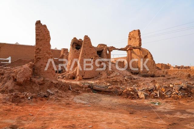 Crumbling mud brick ruins of an ancient building in the historic village of Shaqra, Saudi Arabia