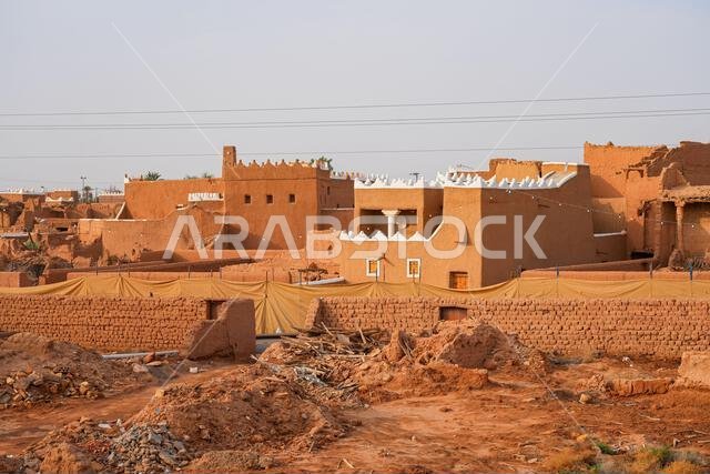 Crumbling mud brick ruins of an ancient building in the historic village of Shaqra, Saudi Arabia