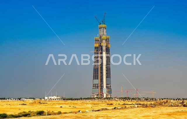Jeddah, Saudi Arabia - February 11, 2026: The Jeddah Tower under construction in the desert, set to become the world's tallest skyscraper upon its completion.