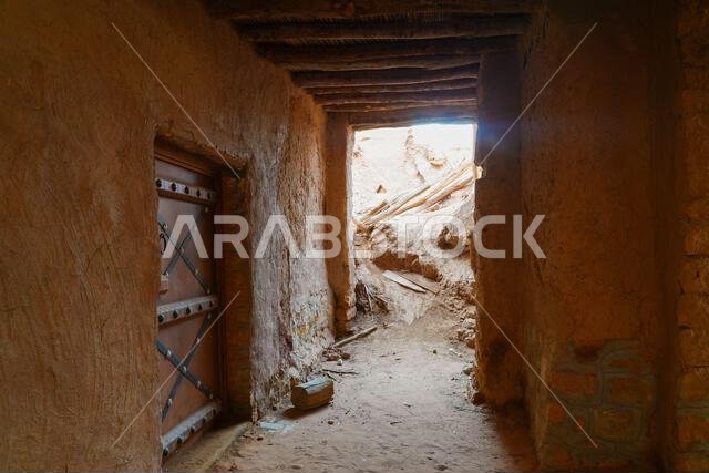 Traditional covered alleyway and adobe architecture in the historic village of Shaqra, Saudi Arabia