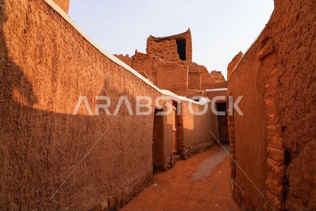 Traditional narrow alleyway in the historic mud brick village of Shaqra, Saudi Arabia