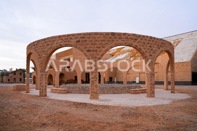 Modern stone arch pavilion at the historic Hijaz Railway Station and museum in Tabuk, Saudi Arabia