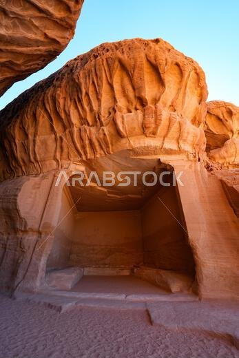 The Diwan, an ancient Nabataean banquet hall carved into Jabal Ithlib in Hegra, AlUla, Saudi Arabia