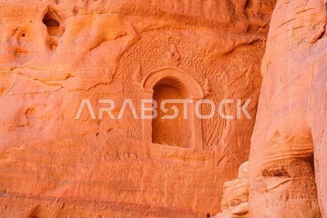 Ancient Nabataean votive shrine carved into the cliffs of Jabal Ithlib in Hegra, AlUla, Saudi Arabia