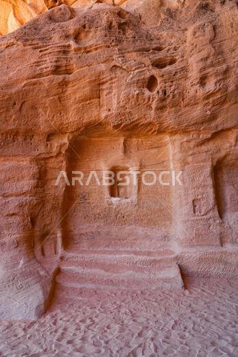 Ancient Nabataean ritual site with carved niches and steps at Jabal Ithlib in Hegra, AlUla, Saudi Arabia