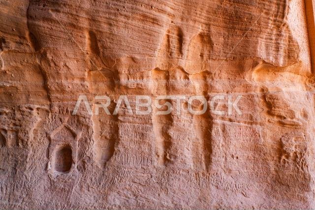 Collection of ancient Nabataean votive niches and baetyls at Jabal Ithlib in Hegra, AlUla, Saudi Arabia