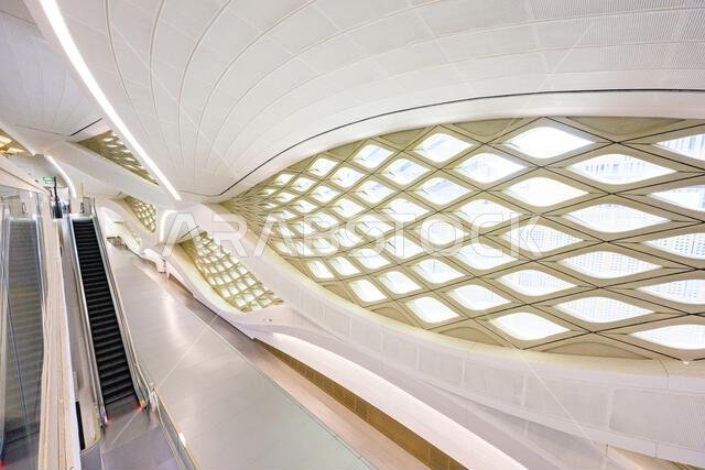 Riyadh's King Abdullah Financial District Metro Station showcasing a futuristic, white, and dynamic interior design