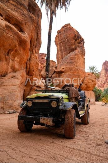 Traditional open-top safari vehicle for exploring the Wadi Al Disah canyon near Tabuk in Saudi Arabia