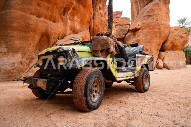 Traditional open-top safari vehicle for exploring the Wadi Al Disah canyon near Tabuk in Saudi Arabia