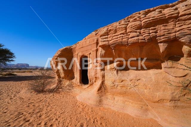 Ancient Nabataean rock-cut tombs at Jabal AlBanat necropolis in Hegra, AlUla, Saudi Arabia