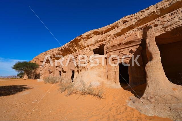 Ancient Nabataean rock-cut tombs at Jabal AlBanat necropolis in Hegra, AlUla, Saudi Arabia Ancient Nabataean rock-cut tombs at Jabal AlBanat necropolis in Hegra, AlUla, Saudi Arabia