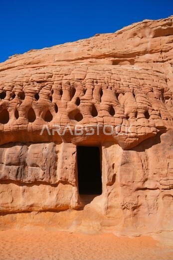 Ancient Nabataean rock-cut tombs at Jabal AlBanat necropolis in Hegra, AlUla, Saudi Arabia