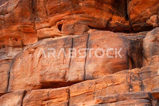 Ancient petroglyphs and rock art in the sandstone canyon of Wadi Al Disah near Tabuk in Saudi Arabia