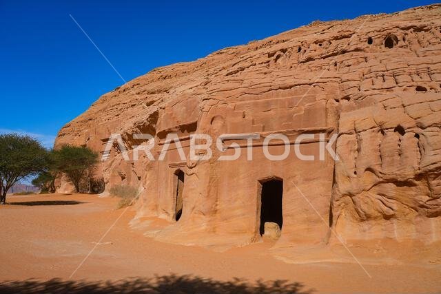 Ancient Nabataean rock-cut tombs at Jabal AlBanat necropolis in Hegra, AlUla, Saudi Arabia