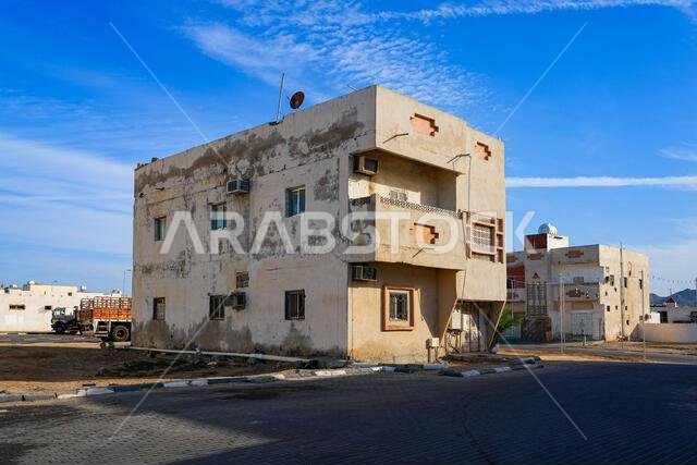 Typical residential architecture in a quiet neighborhood of Umluj, Saudi Arabia