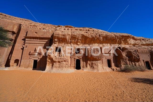 Ancient Nabataean rock-cut tombs at Jabal AlBanat necropolis in Hegra, AlUla, Saudi Arabia