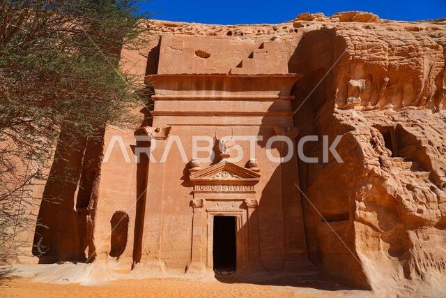 Ancient Nabataean rock-cut tombs at Jabal AlBanat necropolis in Hegra, AlUla, Saudi Arabia