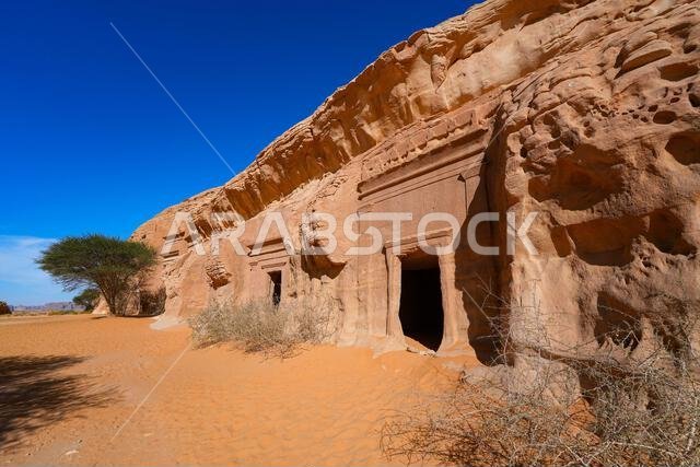 Ancient Nabataean rock-cut tombs at Jabal AlBanat necropolis in Hegra, AlUla, Saudi Arabia