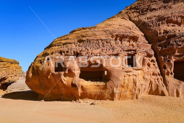 The majestic Jabal AlAhmar monolithic tombs in Hegra, AlUla, Saudi Arabia