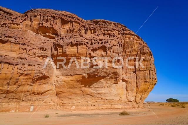 The majestic Jabal AlAhmar monolithic tombs in Hegra, AlUla, Saudi Arabia