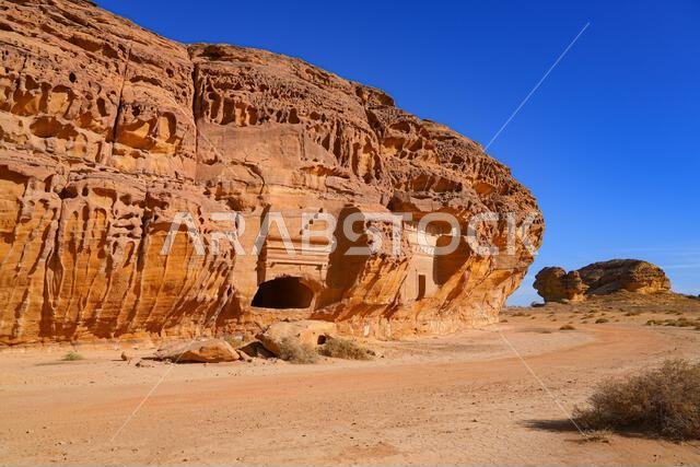 Unfinished Nabataean tomb facade at Jabal AlAhmar in Hegra, AlUla, Saudi Arabia