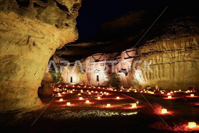 Hegra After Dark experience at the Jabal Al-Khuraymat site of Hegra - Nabataean tombs illuminated by lanterns in AlUla, Saudi Arabia Hegra After Dark experience at the Jabal Al-Khuraymat site of Hegra - Nabataean tombs illuminated by lanterns in AlUla, Saudi Arabia