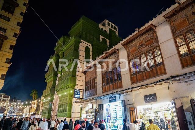 Bustling night life at Nasseef Square in the historic Al-Balad district, the Old Town of Jeddah, Saudi Arabia Bustling night life at Nasseef Square in the historic Al-Balad district, the Old Town of Jeddah, Saudi Arabia
