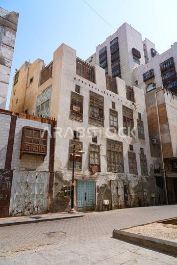 Traditional Hejazi building characterized by mashrabiya screens and wooden balconies in Al-Balad, the Old Town of Jeddah, Saudi Arabia