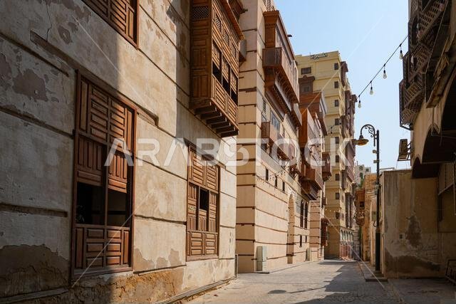 Traditional Hejazi building characterized by mashrabiya screens and wooden balconies in Al-Balad, the Old Town of Jeddah, Saudi Arabia