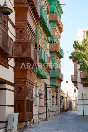 Traditional Hejazi building characterized by mashrabiya screens and wooden balconies in Al-Balad, the Old Town of Jeddah, Saudi Arabia