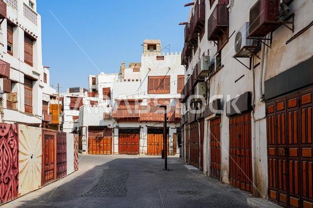 Traditional Hejazi building characterized by mashrabiya screens and wooden balconies in Al-Balad, the Old Town of Jeddah, Saudi Arabia