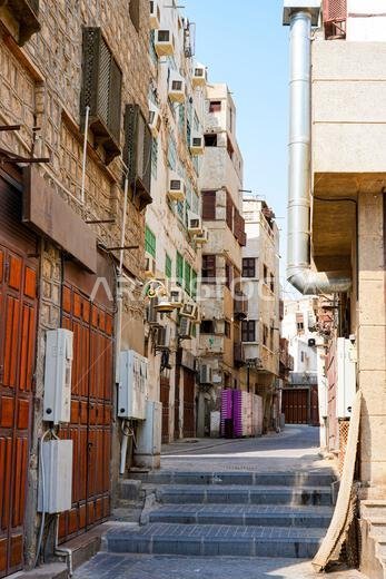 Traditional Hejazi building characterized by mashrabiya screens and wooden balconies in Al-Balad, the Old Town of Jeddah, Saudi Arabia