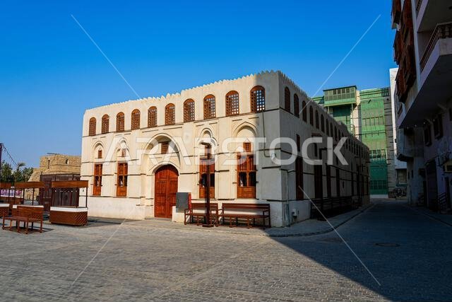 Traditional Hejazi building characterized by mashrabiya screens and wooden balconies in Al-Balad, the Old Town of Jeddah, Saudi Arabia