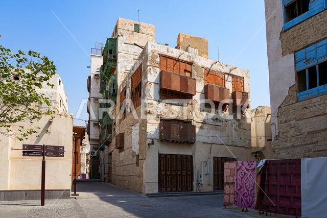 Traditional Hejazi building characterized by mashrabiya screens and wooden balconies in Al-Balad, the Old Town of Jeddah, Saudi Arabia