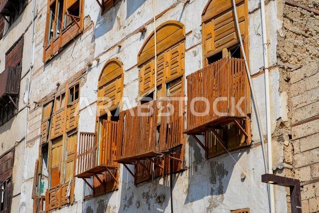 Traditional Hejazi building characterized by mashrabiya screens and wooden balconies in Al-Balad, the Old Town of Jeddah, Saudi Arabia Traditional Hejazi building characterized by mashrabiya screens and wooden balconies in Al-Balad, the Old Town of Jeddah, Saudi Arabia