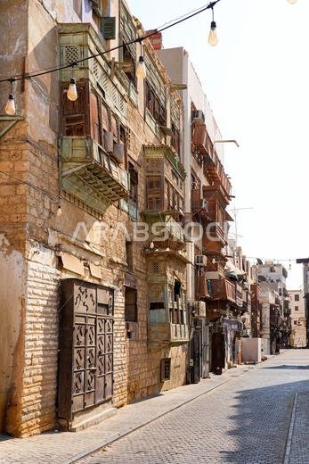 Traditional Hejazi building characterized by mashrabiya screens and wooden balconies in Al-Balad, the Old Town of Jeddah, Saudi Arabia
