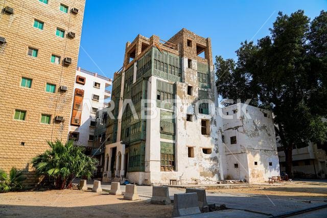 Traditional Hejazi building characterized by mashrabiya screens and wooden balconies in Al-Balad, the Old Town of Jeddah, Saudi Arabia