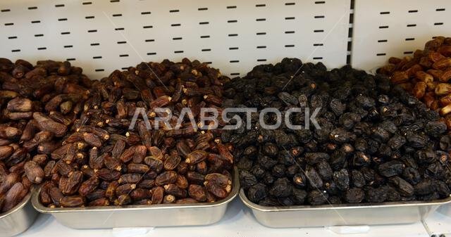 Saudi dates displayed at a date shop at the North Riyadh market area, Riyadh, Saudi Arabia.