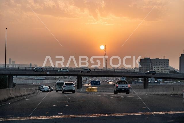 JEDDAH, SAUDI ARABIA - NOVEMBER 14, 2021: Sunset over highways in Jeddah, Saudi Arabia JEDDAH, SAUDI ARABIA - NOVEMBER 14, 2021: Sunset over highways in Jeddah, Saudi Arabia