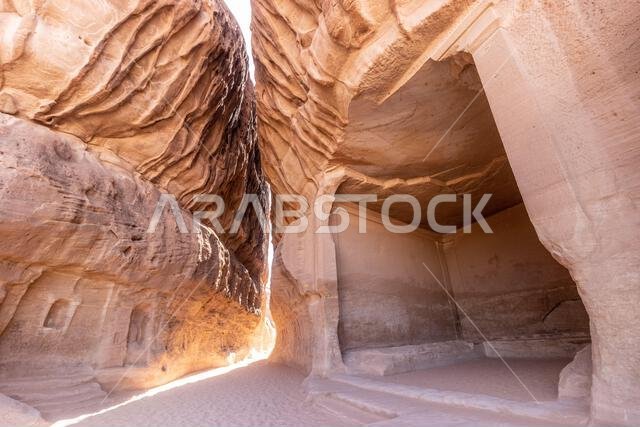 Narrow pasage through Jabal Ithlib mountain, the Siq, next to The Diwan, rock-cut chamber, at Hegra (Mada'in Salih) site near Al Ula, Saudi Arabia