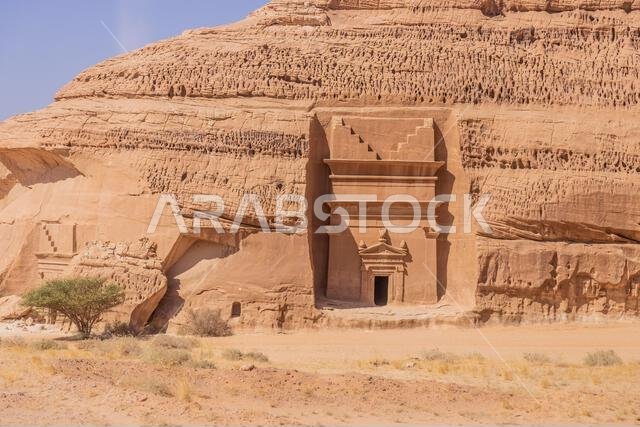 Rock cut tombs in Jabal Al Banat hill at Hegra (Mada'in Salih) site near Al Ula, Saudi Arabia Rock cut tombs in Jabal Al Banat hill at Hegra (Mada'in Salih) site near Al Ula, Saudi Arabia
